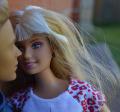 Barbie and Ken dolls in an engagement photo