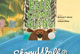 StoryWalk sign with Bear Comes Along