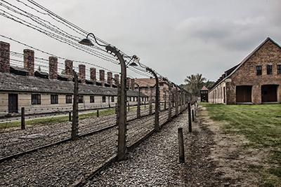 photo of Auschwitz concentration camp with barbed wire