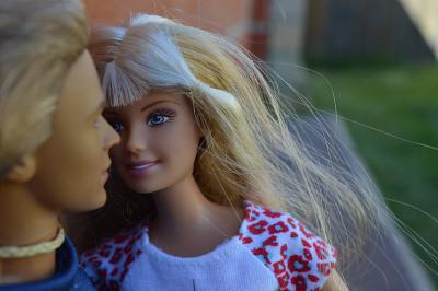 Barbie and Ken dolls in engagement photo