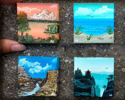 four painted tiny canvases of landscapes