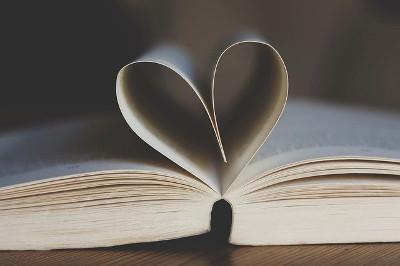 book with pages forming a heart