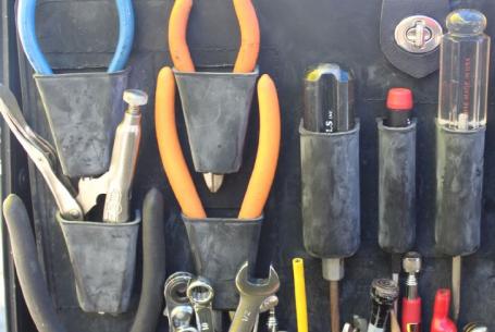 assortment of pliers, screwdrivers, and wrenches