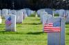 american flags at cemetery